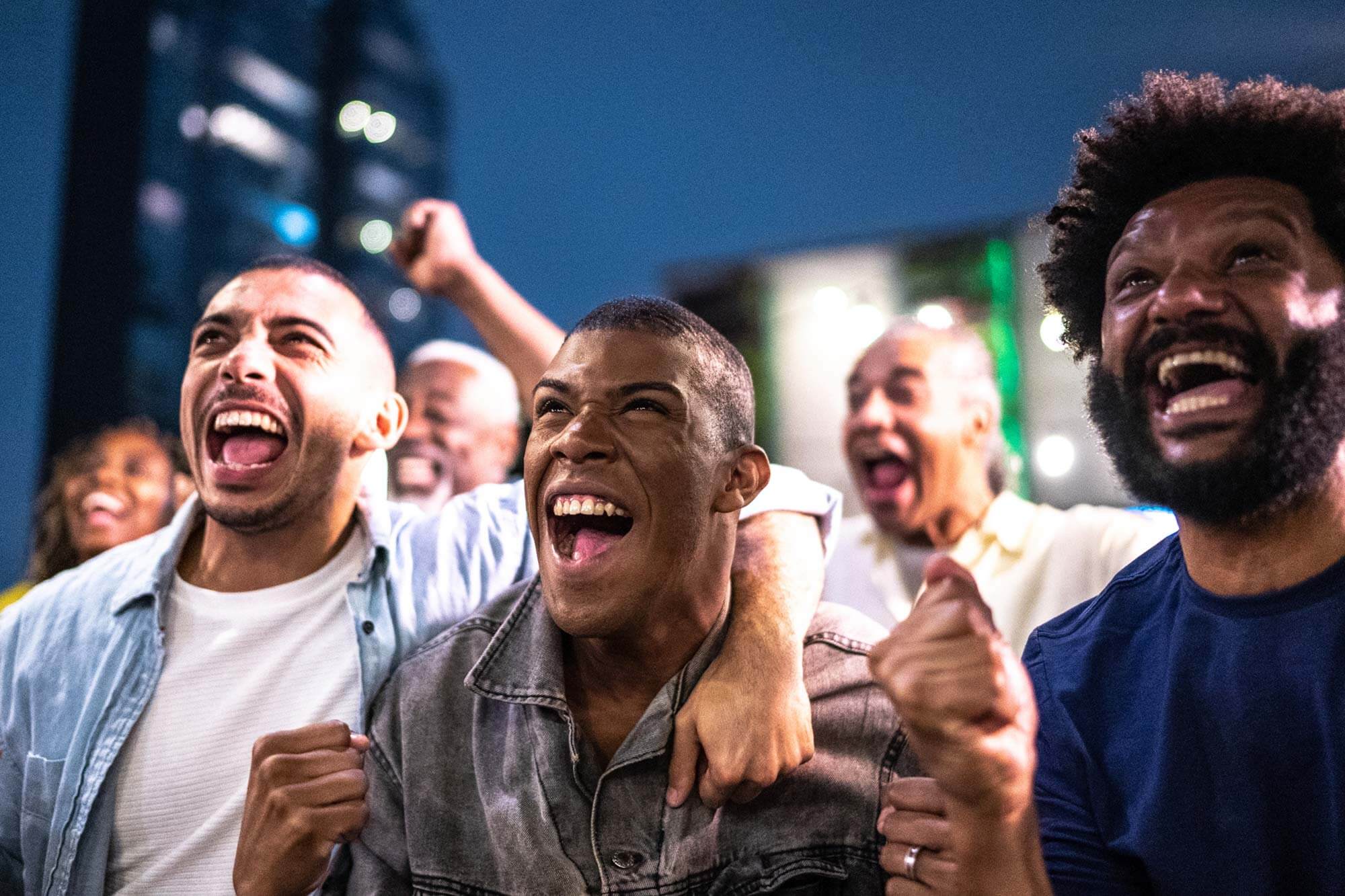 group of friends at sporting event