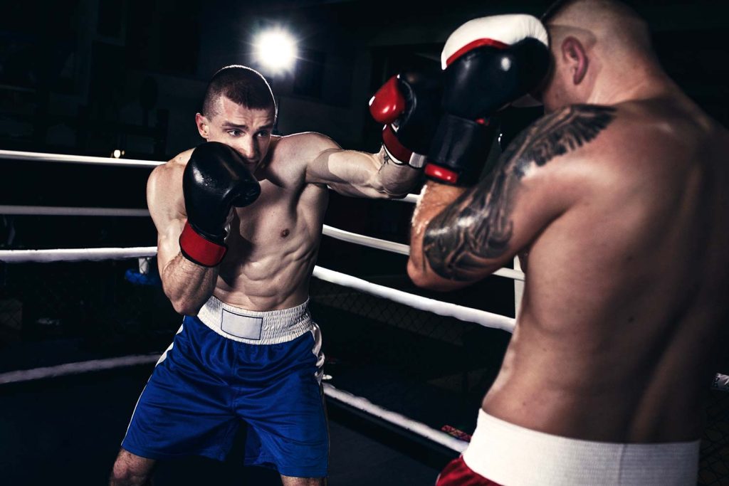 two men boxing in a ring